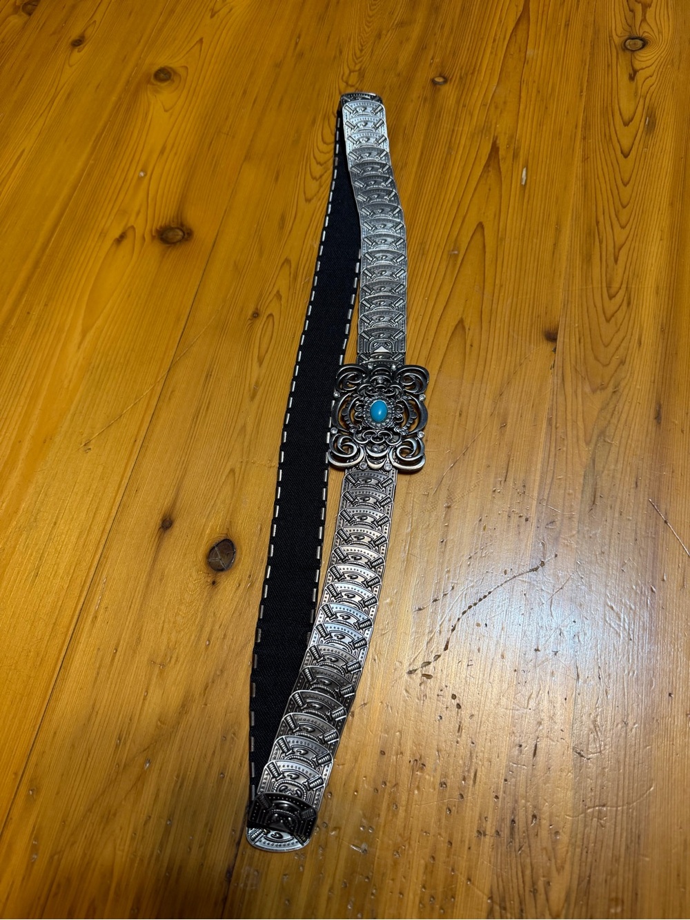 Vintage Silver Metal Stretch Belt with Faux Turquoise Accent measures 38 inches.